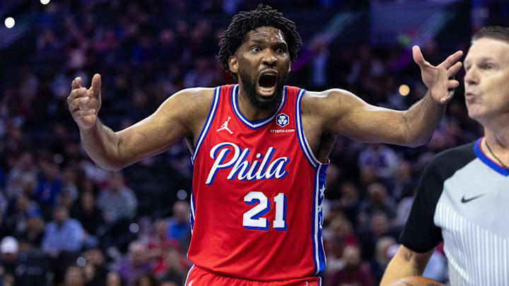 Nov 12, 2024; Philadelphia, Pennsylvania, USA; Philadelphia 76ers center Joel Embiid (21) reacts to a play against the New York Knicks during the third quarter at Wells Fargo Center. Mandatory Credit: Bill Streicher-Imagn Images Nov 12, 2024; Philadelphia, Pennsylvania, USA; Philadelphia 76ers center Joel Embiid (21) reacts to a play against the New York Knicks during the third quarter at Wells Fargo Center. Mandatory Credit: Bill Streicher-Imagn Images