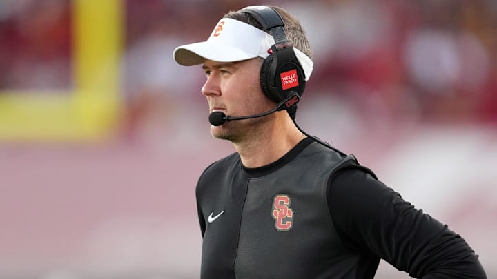 Aug 30, 2025; Los Angeles, California, USA; Southern California Trojans head coach Lincoln Riley watches from the sidelines against the Missouri State Bears in the first half at United Airlines Field at Los Angeles Memorial Coliseum. Mandatory Credit: Kirby Lee-Imagn Images