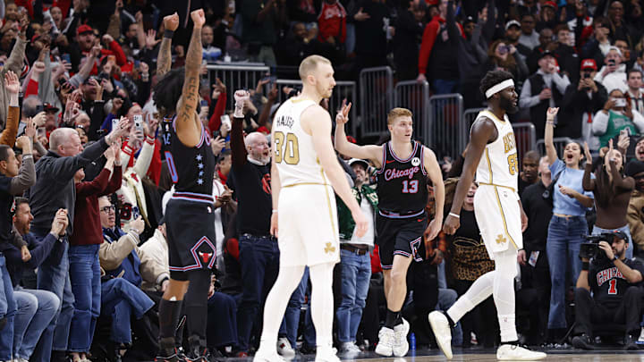Jan 24, 2026; Chicago, Illinois, USA; Chicago Bulls guard Kevin Huerter (13) celebrates after scoring a three-pointer against the Boston Celtics during the second half at United Center. Mandatory Credit: Kamil Krzaczynski-Imagn Images