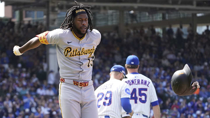 Jun 14, 2025; Chicago, Illinois, USA; Pittsburgh Pirates outfielder Oneil Cruz (15) throws his helmet after making the final out against the Chicago Cubs during the ninth inning at Wrigley Field. Mandatory Credit: David Banks-Imagn Images
