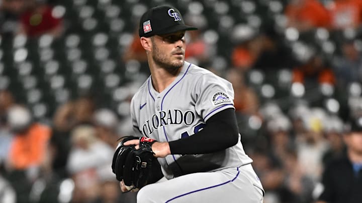 Jul 25, 2025; Baltimore, Maryland, USA;  Colorado Rockies pitcher Tyler Kinley (40) delivers a pitch during the eighth inning against the Baltimore Orioles at Oriole Park at Camden Yards