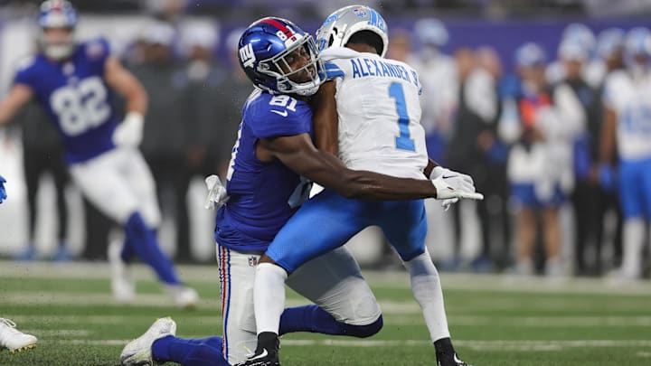 Miles Boykin tackles Lions receiver Maurice Alexander on a punt return. Both players are now on the Bears roster.