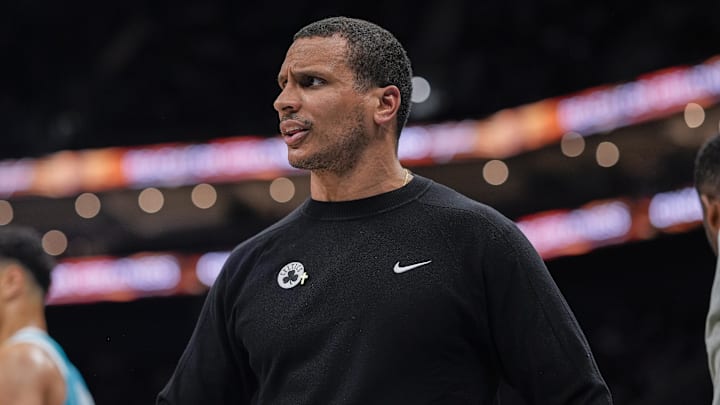 Nov 1, 2024; Charlotte, North Carolina, USA; Boston Celtics head coach Joe Mazzulla  reacts to a call by referee John Conley (56) during the second half against the Charlotte Hornets  at the Spectrum Center. Mandatory Credit: Jim Dedmon-Imagn Images