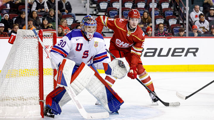 Goaltender Brady Knowling of the U.S National Under-18 Team keeps an eye on Ethan Belchetz in the 2025 CHL-USA Prospects Challenge.