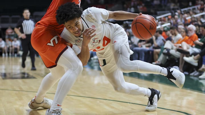Feb 3, 2024; Coral Gables, Florida, USA; Miami Hurricanes guard Nijel Pack (24) drives to the basket against the Virginia Tech Hokies during the second half at Watsco Center. Mandatory Credit: Sam Navarro-Imagn Images