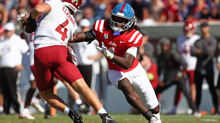 Oct 11, 2025; Oxford, Mississippi, USA; Mississippi Rebels linebacker Princewill Umanmielen (1) sacks Washington State Cougars quarterback Zevi Eckhaus (4) during the fourth quarter at Vaught-Hemingway Stadium. Mandatory Credit: Petre Thomas-Imagn Images