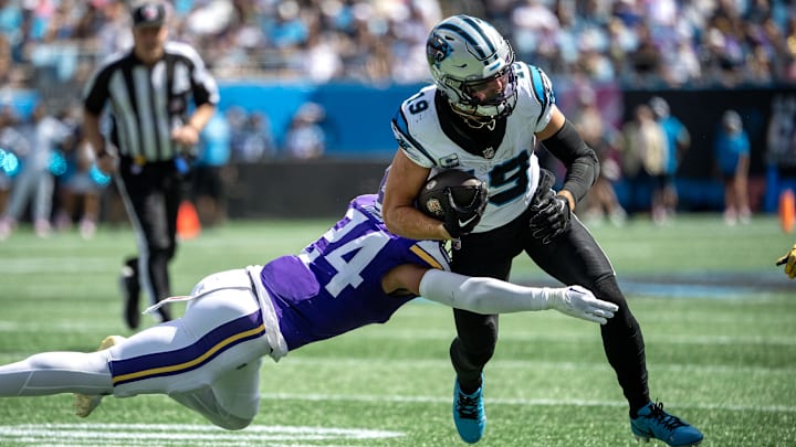 Oct 1, 2023; Charlotte, North Carolina, USA; Carolina Panthers wide receiver Adam Thielen (19) with the ball as Minnesota Vikings safety Camryn Bynum (24) defends in the second quarter at Bank of America Stadium. Mandatory Credit: Bob Donnan-Imagn Images Oct 1, 2023; Charlotte, North Carolina, USA; Carolina Panthers wide receiver Adam Thielen (19) with the ball as Minnesota Vikings safety Camryn Bynum (24) defends in the second quarter at Bank of America Stadium. Mandatory Credit: Bob Donnan-Imagn Images