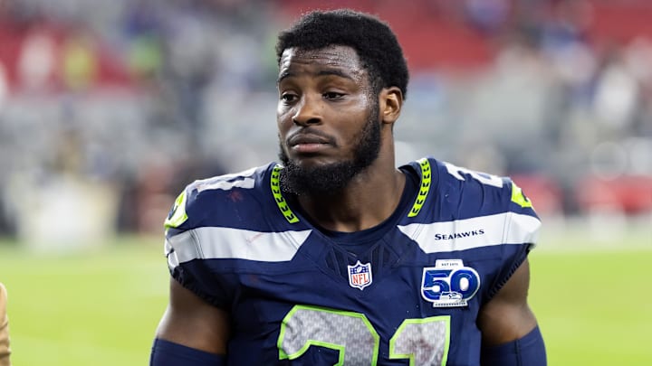 Sep 25, 2025; Glendale, Arizona, USA; Seattle Seahawks cornerback Devon Witherspoon (21) against the Arizona Cardinals at State Farm Stadium. Mandatory Credit: Mark J. Rebilas-Imagn Images