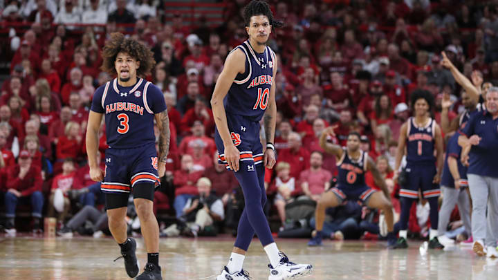 Jan 6, 2024; Fayetteville, Arkansas, USA; Auburn Tigers guard Chad Baker-Mazara (10) celebrates with