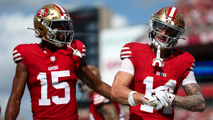 Nov 10, 2024; Tampa, Florida, USA; San Francisco 49ers wide receiver Ricky Pearsall (14) celebrates with wide receiver Jauan Jennings (15) after scoring a touchdown against the Tampa Bay Buccaneers in the first quarter at Raymond James Stadium. Mandatory Credit: Nathan Ray Seebeck-Imagn Images
