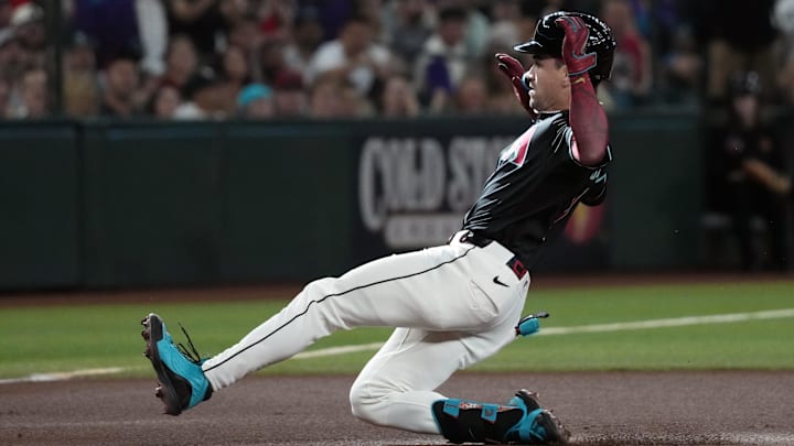 Jul 19, 2025; Phoenix, Arizona, USA; Arizona Diamondbacks outfielder Corbin Carroll (7) hits a triple against the St. Louis Cardinals in the first inning at Chase Field. Mandatory Credit: Rick Scuteri-Imagn Images