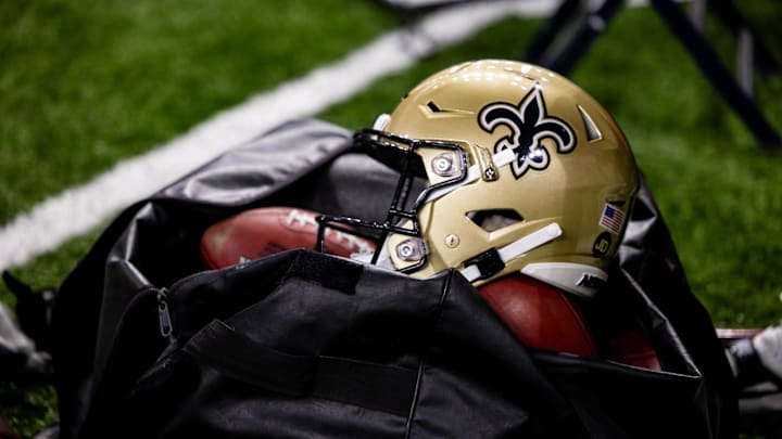 Nov 5, 2023; New Orleans, Louisiana, USA;  Detailed view of the New Orleans Saints helmet and ball bag against the Chicago Bears during the first half at the Caesars Superdome. Mandatory Credit: Stephen Lew-Imagn Images