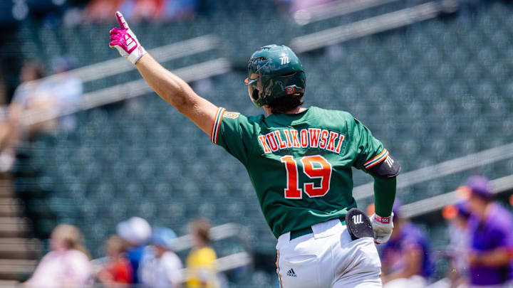 Miami (Fl) Hurricanes outfielder Jake Kulikowski (19) celebrates a home run against the Clemson Tigers in the ninth inning during the ACC Baseball Tournament at Truist Field. 