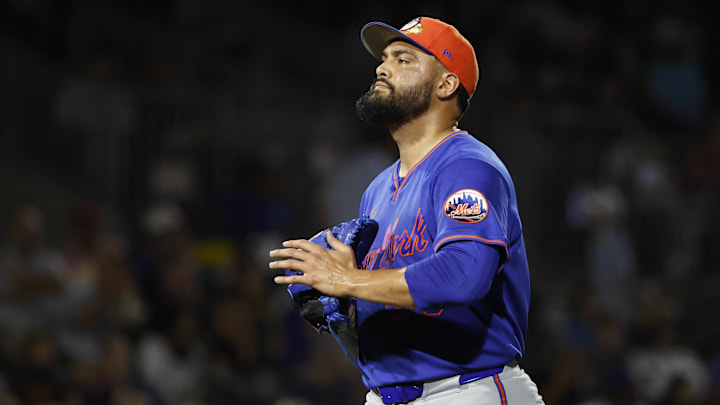 Mar 6, 2026; Jupiter, Florida, USA;  New York Mets pitcher Sean Manaea (59) walks off the field against the Miami Marlins after the first inning at Roger Dean Chevrolet Stadium. Mandatory Credit: Rhona Wise-Imagn Images