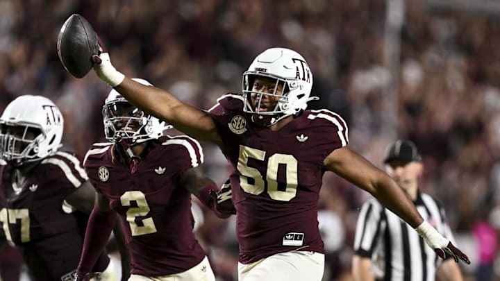 Oct 11, 2025; College Station, Texas, USA; Texas A&M Aggies defensive end Dayon Hayes (50) reacts after recovering a fumble in the fourth quarter against the Florida Gators at Kyle Field. Mandatory Credit: Maria Lysaker-Imagn Images 