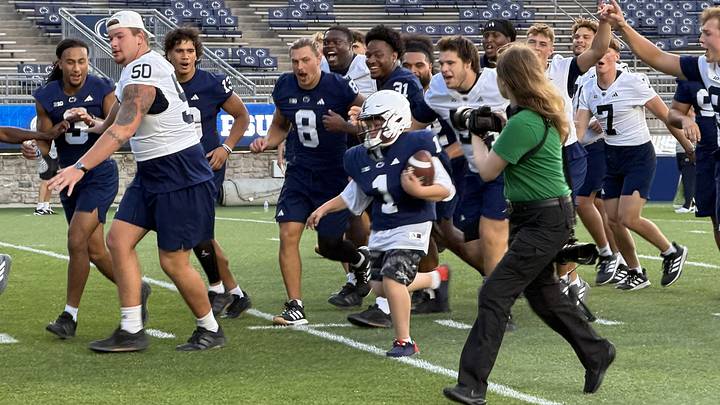 Penn State Nittany Lions football players participate in Victory Day at Beaver Stadium.