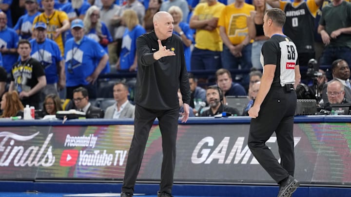 Jun 22, 2025; Oklahoma City, Oklahoma, USA: Indiana Pacers head coach Rick Carlisle talks with referee Josh Tiven after a call following a play against the Oklahoma City Thunder during the second half of game seven of the 2025 NBA Finals at Paycom Center. Mandatory Credit: Kyle Terada-Imagn Images