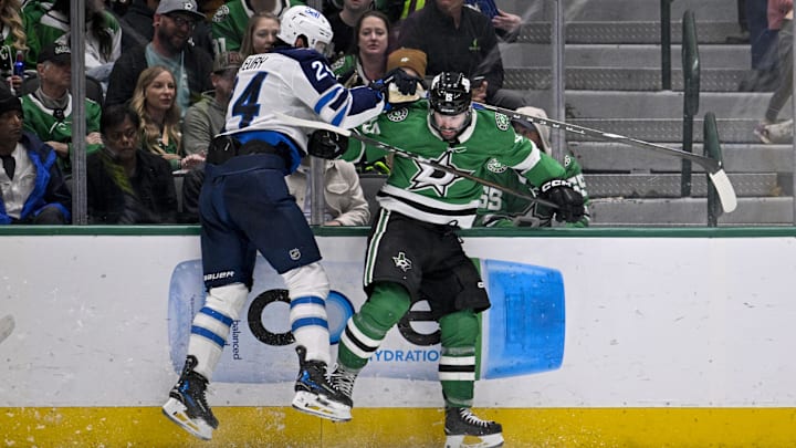 Dec 1, 2024; Dallas, Texas, USA; Dallas Stars center Colin Blackwell (15) checks Winnipeg Jets defenseman Haydn Fleury (24) during the third period at the American Airlines Center. Mandatory Credit: Jerome Miron-Imagn Images Dec 1, 2024; Dallas, Texas, USA; Dallas Stars center Colin Blackwell (15) checks Winnipeg Jets defenseman Haydn Fleury (24) during the third period at the American Airlines Center. Mandatory Credit: Jerome Miron-Imagn Images
