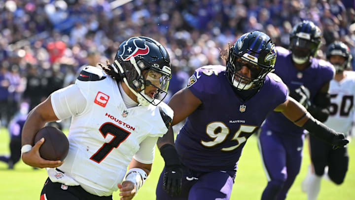 Oct 5, 2025; Baltimore, Maryland, USA; Houston Texans quarterback C.J. Stroud (7) runs for a gain past Baltimore Ravens linebacker Tavius Robinson (95) during the second quarter at M&T Bank Stadium. Mandatory Credit: Rafael Suanes-Imagn Images Oct 5, 2025; Baltimore, Maryland, USA; Houston Texans quarterback C.J. Stroud (7) runs for a gain past Baltimore Ravens linebacker Tavius Robinson (95) during the second quarter at M&T Bank Stadium. Mandatory Credit: Rafael Suanes-Imagn Images