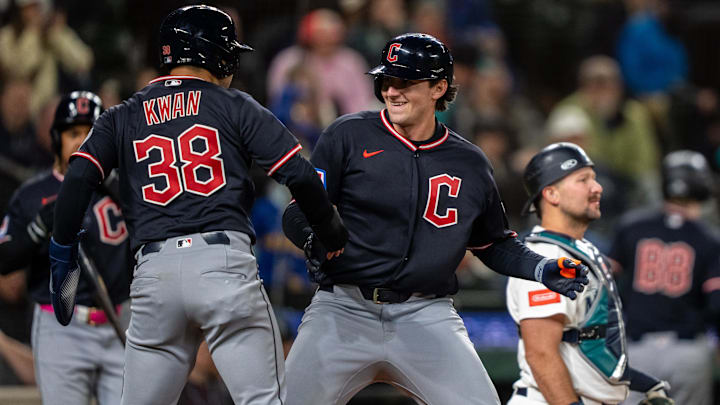 Mar 28, 2026: Cleveland Guardians designated hitter Chase DeLauter (24) celegbrates with centerfielder Steven Kwan (38) after hitting a two-run home run during the tenth inning against the Seattle Mariners at T-Mobile Park.