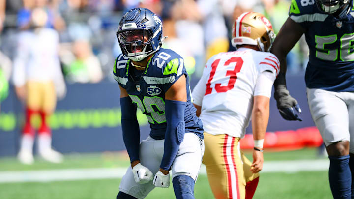Sep 7, 2025; Seattle, Washington, USA; Seattle Seahawks linebacker Derick Hall (58) and Seattle Seahawks safety Julian Love (20) celebrate after a play during the first half against San Francisco 49ers at Lumen Field. Mandatory Credit: Steven Bisig-Imagn Images Sep 7, 2025; Seattle, Washington, USA; Seattle Seahawks linebacker Derick Hall (58) and Seattle Seahawks safety Julian Love (20) celebrate after a play during the first half against San Francisco 49ers at Lumen Field. Mandatory Credit: Steven Bisig-Imagn Images