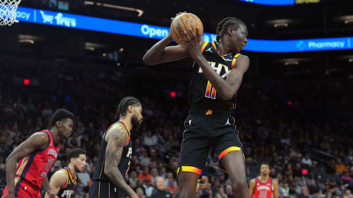 Feb 28, 2025; Phoenix, Arizona, USA; Phoenix Suns center Bol Bol (11) grabs a rebound against the New Orleans Pelicans during the first half at Footprint Center. Mandatory Credit: Joe Camporeale-Imagn Images