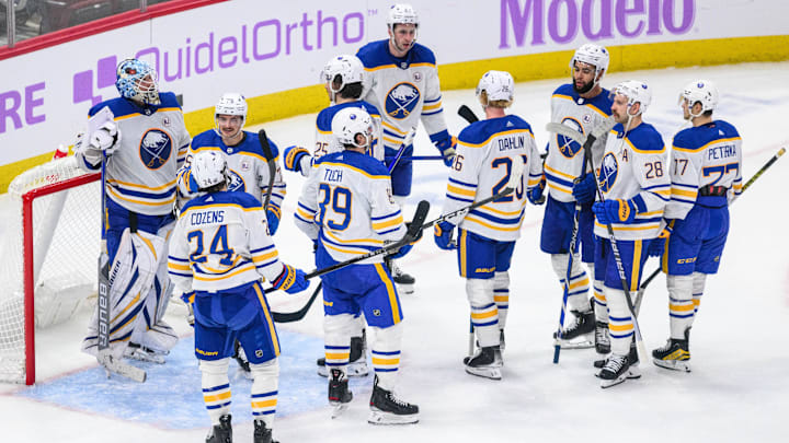 Nov 19, 2023; Chicago, Illinois, USA; Buffalo Sabres players celebrate their win against the Chicago Blackhawks after the game at the United Center. Mandatory Credit: Daniel Bartel-USA TODAY Sports