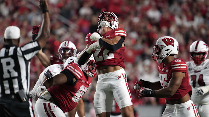 Aug 28, 2025; Madison, Wisconsin, USA;  Wisconsin Badgers linebacker Mason Reiger (22) celebrates following a sack during the second quarter against the Miami (OH) RedHawks at Camp Randall Stadium. Mandatory Credit: Jeff Hanisch-Imagn Images