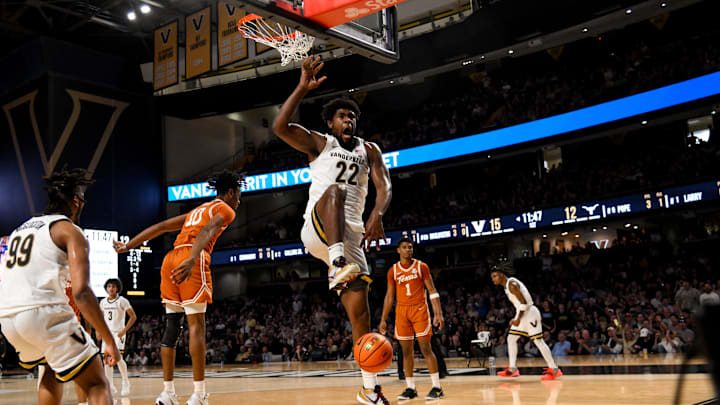 Feb 8, 2025; Nashville, Tennessee, USA; Vanderbilt Commodores forward Jaylen Carey (22) celebrates the big slam against the Texas Longhorns during the first half at Memorial Gymnasium. Mandatory Credit: Steve Roberts-Imagn Images