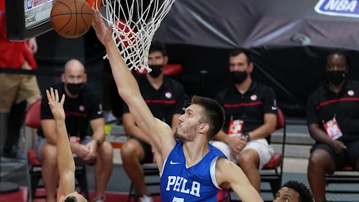 Aug 12, 2021; Las Vegas, Nevada, USA; Philadelphia 76ers forward Filip Petrusev (5) blocks a shot against Atlanta Hawks guard Max Heidegger (26) during an NBA Summer League game at Cox Pavilion. Mandatory Credit: Stephen R. Sylvanie-Imagn Images Aug 12, 2021; Las Vegas, Nevada, USA; Philadelphia 76ers forward Filip Petrusev (5) blocks a shot against Atlanta Hawks guard Max Heidegger (26) during an NBA Summer League game at Cox Pavilion. Mandatory Credit: Stephen R. Sylvanie-Imagn Images
