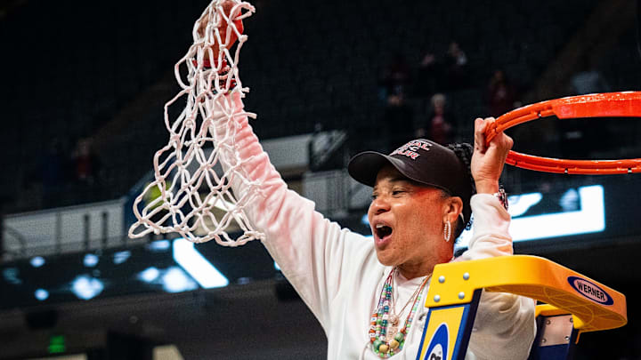 South Carolina Gamecocks head coach Dawn Staley cuts down the net as the Gamecocks celebrate their NCAA Regional Final game win over Duke at Legacy Arena in Birmingham Alabama, March 30, 2025.