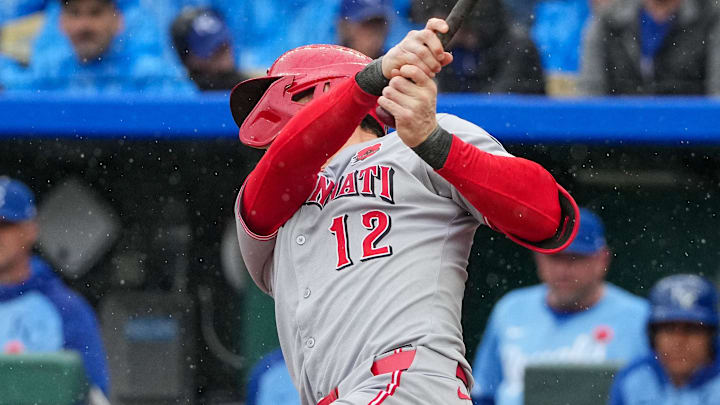 May 26, 2025; Kansas City, Missouri, USA; Cincinnati Reds left fielder Austin Hays (12) hits a one run sacrifice fly against the Kansas City Royals in the first inning at Kauffman Stadium. Mandatory Credit: Denny Medley-Imagn Images May 26, 2025; Kansas City, Missouri, USA; Cincinnati Reds left fielder Austin Hays (12) hits a one run sacrifice fly against the Kansas City Royals in the first inning at Kauffman Stadium. Mandatory Credit: Denny Medley-Imagn Images