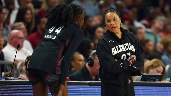 Apr 5, 2026; Phoenix, AZ, USA; South Carolina Gamecocks head coach Dawn Staley with guard Agot Makeer (44) against the UCLA Bruins during the National Championship game of the women's 2026 NCAA Tournament at Mortgage Matchup Center. Mandatory Credit: Mark J. Rebilas-Imagn Images