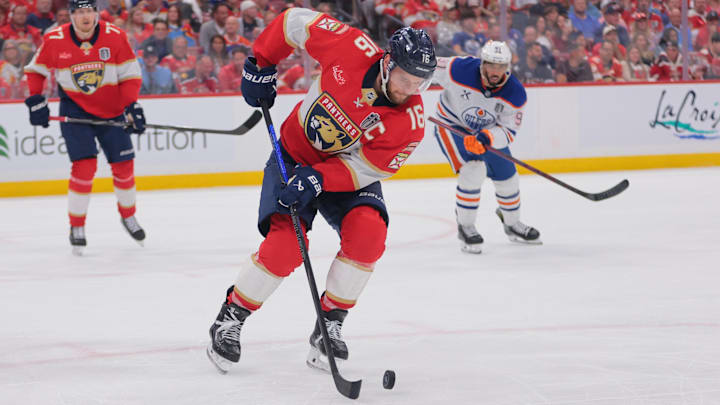 Jun 9, 2025; Sunrise, Florida, USA; Florida Panthers forward Aleksander Barkov (16) controls the puck during the third period against the Edmonton Oilers in game three of the 2025 Stanley Cup Final at Amerant Bank Arena. Mandatory Credit: Sam Navarro-Imagn Images