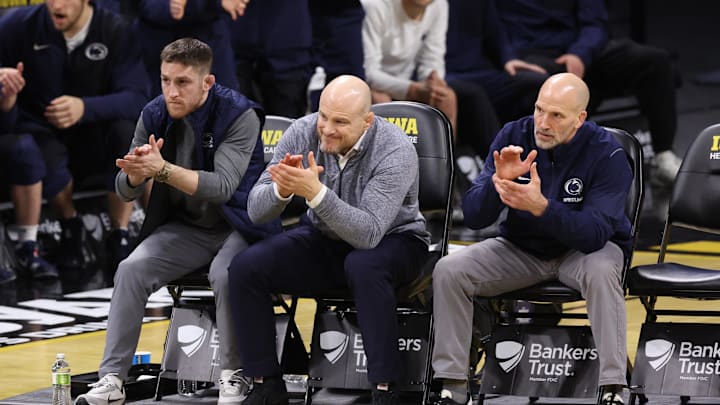 Penn State Nittany Lions head coach Cael Sanderson watches his team wrestle the Iowa Hawkeyes at Carver-Hawkeye Arena. 