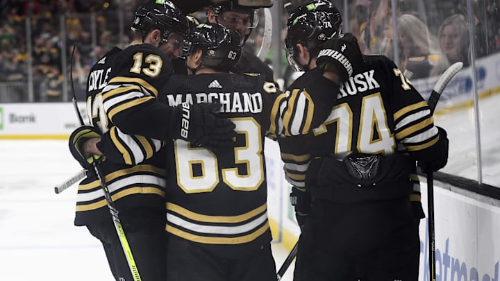 Mar 16, 2024; Boston, Massachusetts, USA; Boston Bruins left wing Jake DeBrusk (74) is congratulated