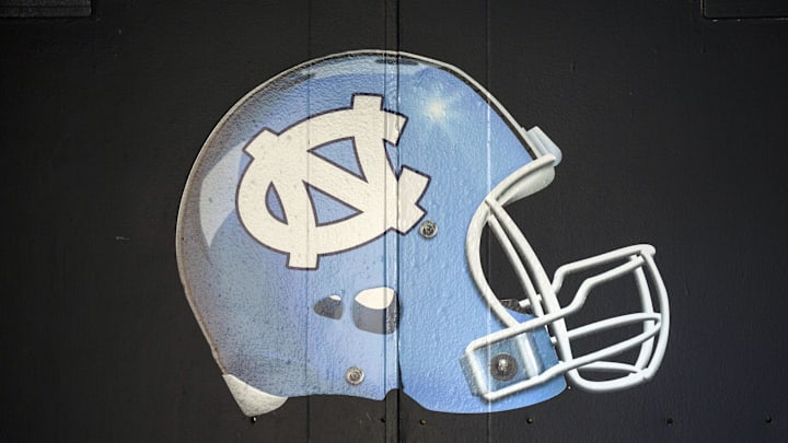 Dec 30, 2016; El Paso, TX, USA; A view of the North Carolina Tar Heels logo and helmet outside their locker room before facing the Stanford Cardinal at Sun Bowl Stadium. Mandatory Credit: Ivan Pierre Aguirre-Imagn Images Dec 30, 2016; El Paso, TX, USA; A view of the North Carolina Tar Heels logo and helmet outside their locker room before facing the Stanford Cardinal at Sun Bowl Stadium. Mandatory Credit: Ivan Pierre Aguirre-Imagn Images