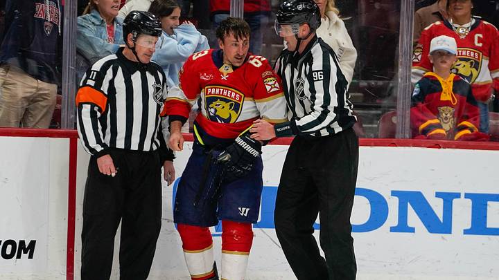 Dec 27, 2025; Sunrise, Florida, USA; Florida Panthers left wing Brad Marchand (63) is separated from a fight against the Tampa Bay Lightning during the third period at Amerant Bank Arena. Mandatory Credit: Jeff Romance-Imagn Images