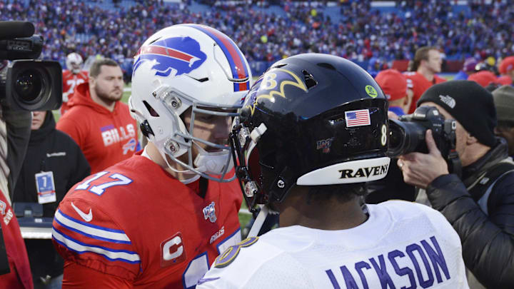 Dec 8, 2019; Orchard Park, NY, USA; Buffalo Bills quarterback Josh Allen (17) meets Baltimore Ravens quarterback Lamar Jackson (8) at mid-field after a game at New Era Field. Mandatory Credit: Mark Konezny-Imagn Images