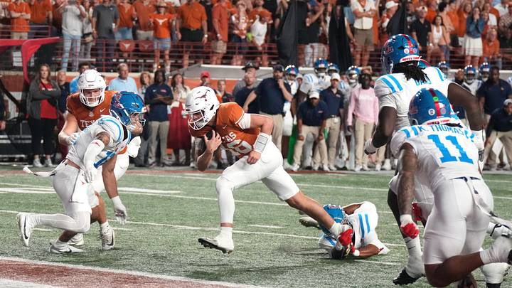 Oct 24, 2026; Austin, Texas, USA; Texas Longhorns quarterback Arch Manning (16) scores a rushing touchdown during the first half against the Mississippi Rebels at Darrell K Royal-Texas Memorial Stadium. Mandatory Credit: Scott Wachter-Imagn Images Oct 24, 2026; Austin, Texas, USA; Texas Longhorns quarterback Arch Manning (16) scores a rushing touchdown during the first half against the Mississippi Rebels at Darrell K Royal-Texas Memorial Stadium. Mandatory Credit: Scott Wachter-Imagn Images