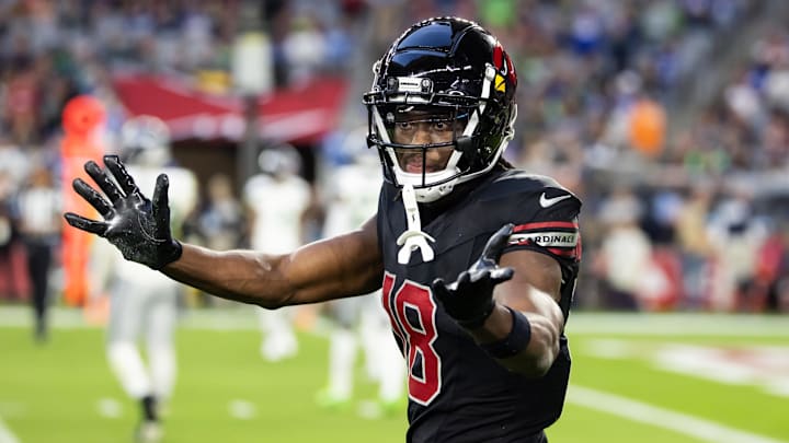 Dec 8, 2024; Glendale, Arizona, USA; Arizona Cardinals wide receiver Marvin Harrison Jr. (18) against the Seattle Seahawks at State Farm Stadium. Mandatory Credit: Mark J. Rebilas-Imagn Images