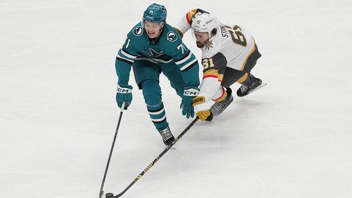 Jan 7, 2025; San Jose, California, USA; San Jose Sharks center Macklin Celebrini (71) and Vegas Golden Knights right wing Mark Stone (61) reach for the puck during the third period at SAP Center at San Jose. Mandatory Credit: Darren Yamashita-Imagn Images Jan 7, 2025; San Jose, California, USA; San Jose Sharks center Macklin Celebrini (71) and Vegas Golden Knights right wing Mark Stone (61) reach for the puck during the third period at SAP Center at San Jose. Mandatory Credit: Darren Yamashita-Imagn Images