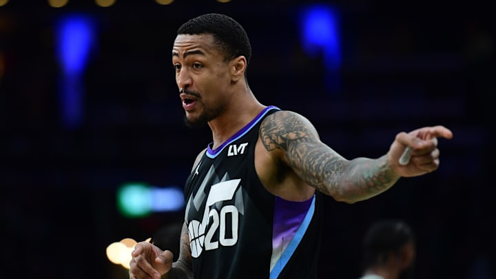 Mar 10, 2025; Boston, Massachusetts, USA;  Utah Jazz forward John Collins (20) reacts towards the official after a non call during the first half against the Boston Celtics at TD Garden. Mandatory Credit: Bob DeChiara-Imagn Images