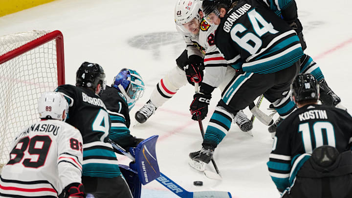 Mar 23, 2024; San Jose, California, USA; Chicago Blackhawks center Philipp Kurashev (23) scores the