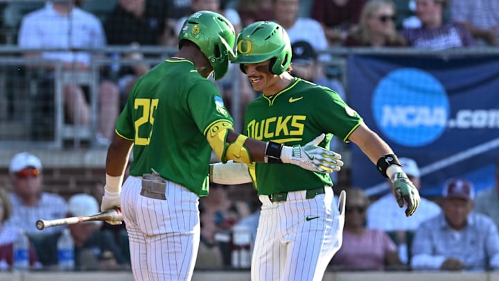 Jun 9, 2024; College Station, TX, USA; Oregon outfielder Anson Aroz (77) celebrates after hitting a solo home run during the first inning against Texas A&M at Olsen Field, Blue Bell Park.