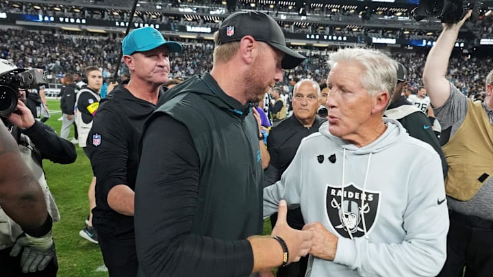 Nov 2, 2025; Paradise, Nevada, USA; The Jacksonville Jaguars head coach Liam Coen and the Las Vegas Raiders head coach Pete Carroll meet after the win against the Las Vegas Raiders at Allegiant Stadium. Mandatory Credit: Kirby Lee-Imagn Images Nov 2, 2025; Paradise, Nevada, USA; The Jacksonville Jaguars head coach Liam Coen and the Las Vegas Raiders head coach Pete Carroll meet after the win against the Las Vegas Raiders at Allegiant Stadium. Mandatory Credit: Kirby Lee-Imagn Images