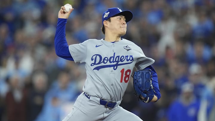 Oct 31, 2025; Toronto, Ontario, CAN; Los Angeles Dodgers pitcher Yoshinobu Yamamoto (18) pitches against the Toronto Blue Jays in the second inning during game six of the 2025 MLB World Series at Rogers Centre. Mandatory Credit: John E. Sokolowski-Imagn Images Oct 31, 2025; Toronto, Ontario, CAN; Los Angeles Dodgers pitcher Yoshinobu Yamamoto (18) pitches against the Toronto Blue Jays in the second inning during game six of the 2025 MLB World Series at Rogers Centre. Mandatory Credit: John E. Sokolowski-Imagn Images