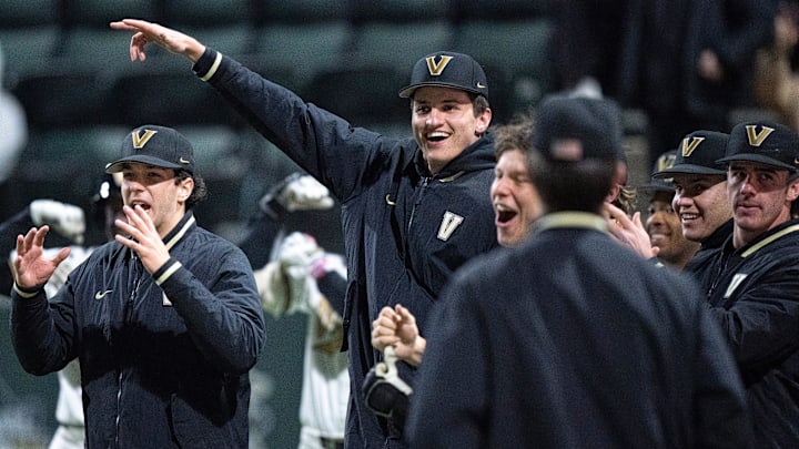 The Vanderbilt Commodores bench celebrates the home run of JD Rogers (18) against the Air Force Falcons at Hawkins Field in Nashville, Tenn., Monday, Feb. 17, 2025. The Commodores beat the Falcons 3-1.