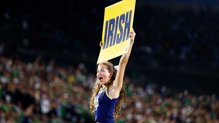 A Notre Dame cheerleader chants with fans during the second half of a NCAA football game against Purdue at Notre Dame Stadium on Saturday, Sept. 20, 2025, in South Bend. A Notre Dame cheerleader chants with fans during the second half of a NCAA football game against Purdue at Notre Dame Stadium on Saturday, Sept. 20, 2025, in South Bend.