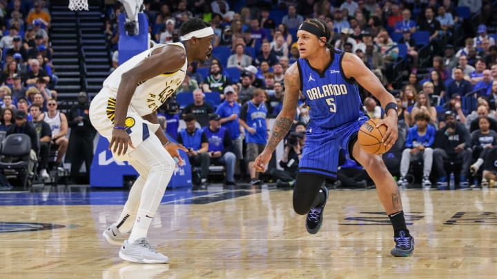 Mar 10, 2024; Orlando, Florida, USA; Orlando Magic forward Paolo Banchero (5) handles the ball against Indiana Pacers forward Pascal Siakam (43) during the first quarter at KIA Center. Mandatory Credit: Mike Watters-USA TODAY Sports Mar 10, 2024; Orlando, Florida, USA; Orlando Magic forward Paolo Banchero (5) handles the ball against Indiana Pacers forward Pascal Siakam (43) during the first quarter at KIA Center. Mandatory Credit: Mike Watters-USA TODAY Sports